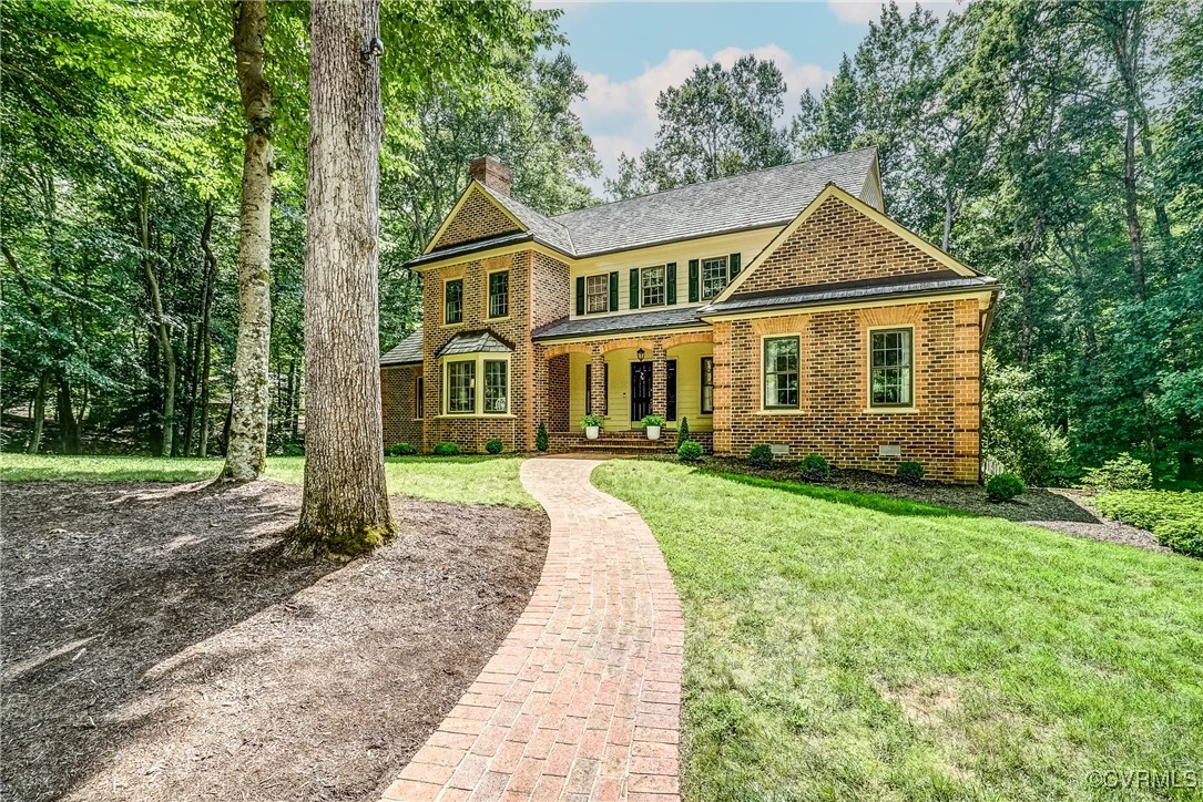 3630 Lansdowne Road Midlothian, VA 23113 - Photo 3 of 50 a front view of a house with a yard
