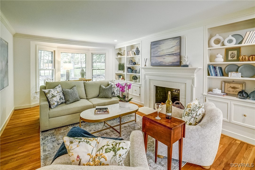 3630 Lansdowne Road Midlothian, VA 23113 - Photo 9 of 50 a living room with furniture and a fireplace