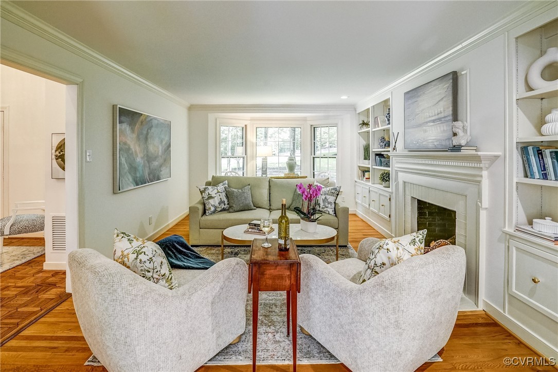 3630 Lansdowne Road Midlothian, VA 23113 - Photo 10 of 50 a living room with furniture a fireplace and a flat screen tv