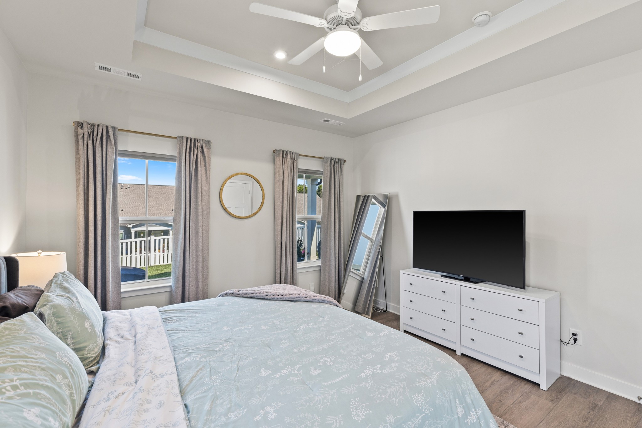 203 Pitchfork Way Gallatin, TN 37066 - Photo 21 of 39 a bedroom with a bed and a flat tv screen on dresser