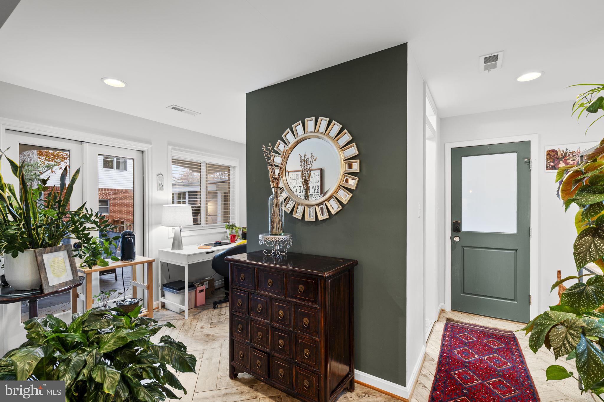 8600 Victoria Road Springfield, VA 22151 - Photo 7 of 15 Mudroom with office space and door to carport