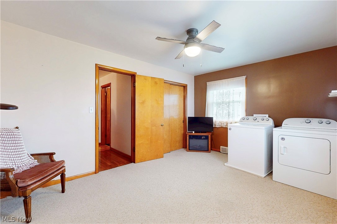 391 Canton Road Steubenville, OH 43953 - Photo 32 of 40 Laundry room featuring light colored carpet, ceiling fan, and washer and dryer