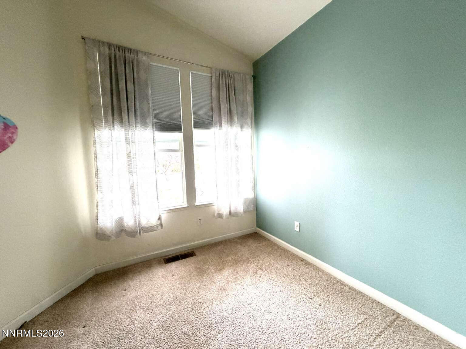4695 Hampton Lane Reno, NV 89519 - Photo 12 of 20 an empty room with windows