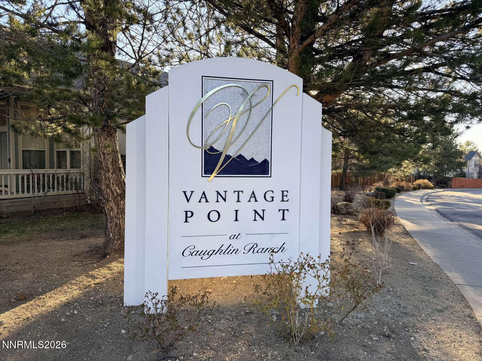 4695 Hampton Lane Reno, NV 89519 - Photo 20 of 20 a sign that is on the side of the road