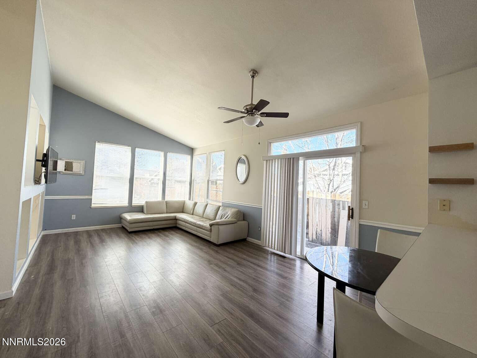 4695 Hampton Lane Reno, NV 89519 - Photo 3 of 20 a view of livingroom with furniture and wooden floor