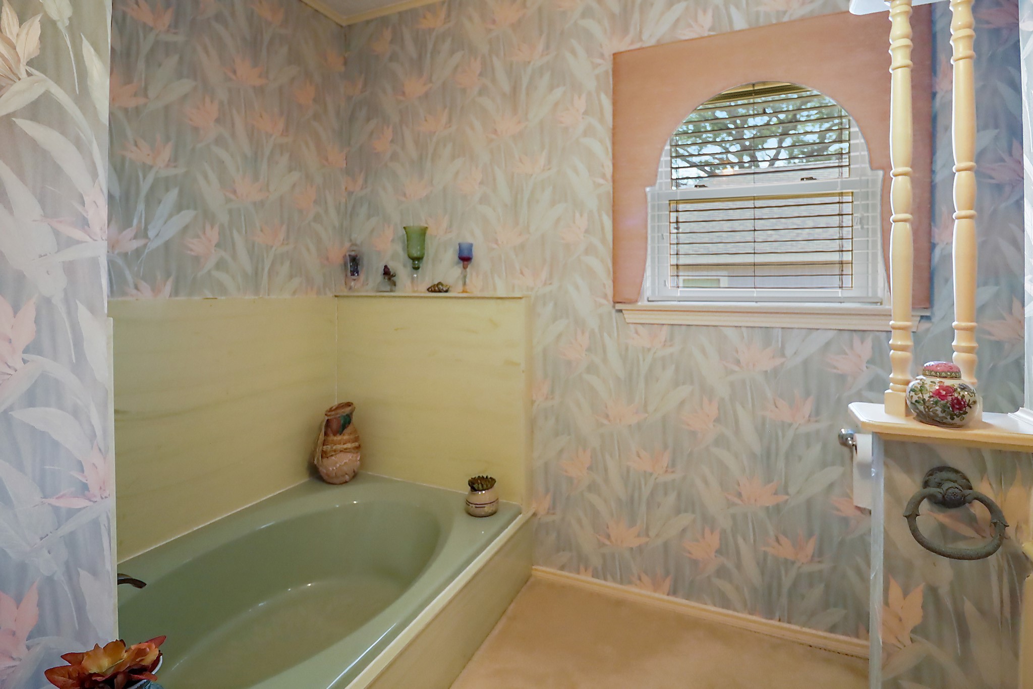 405 Park Street Anahuac, TX 77514 - Photo 23 of 37 a bathroom with a bathtub and a shower
