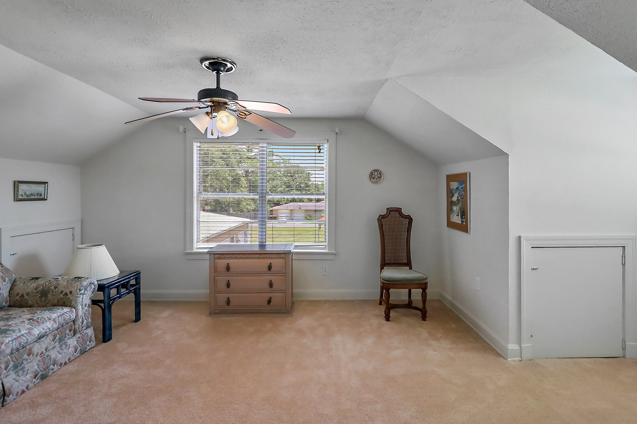 405 Park Street Anahuac, TX 77514 - Photo 29 of 37 a living room with furniture and a window