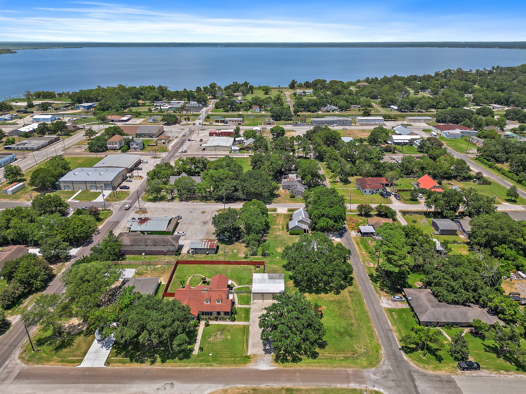 405 Park Street Anahuac, TX 77514 - Photo 35 of 37 an aerial view of residential houses with outdoor space and ocean view