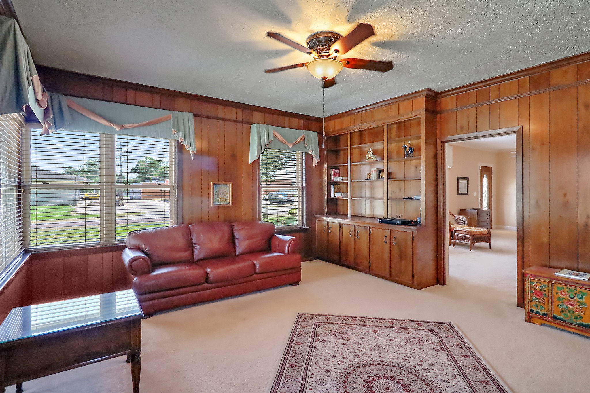 405 Park Street Anahuac, TX 77514 - Photo 10 of 37 a living room with furniture and a large window
