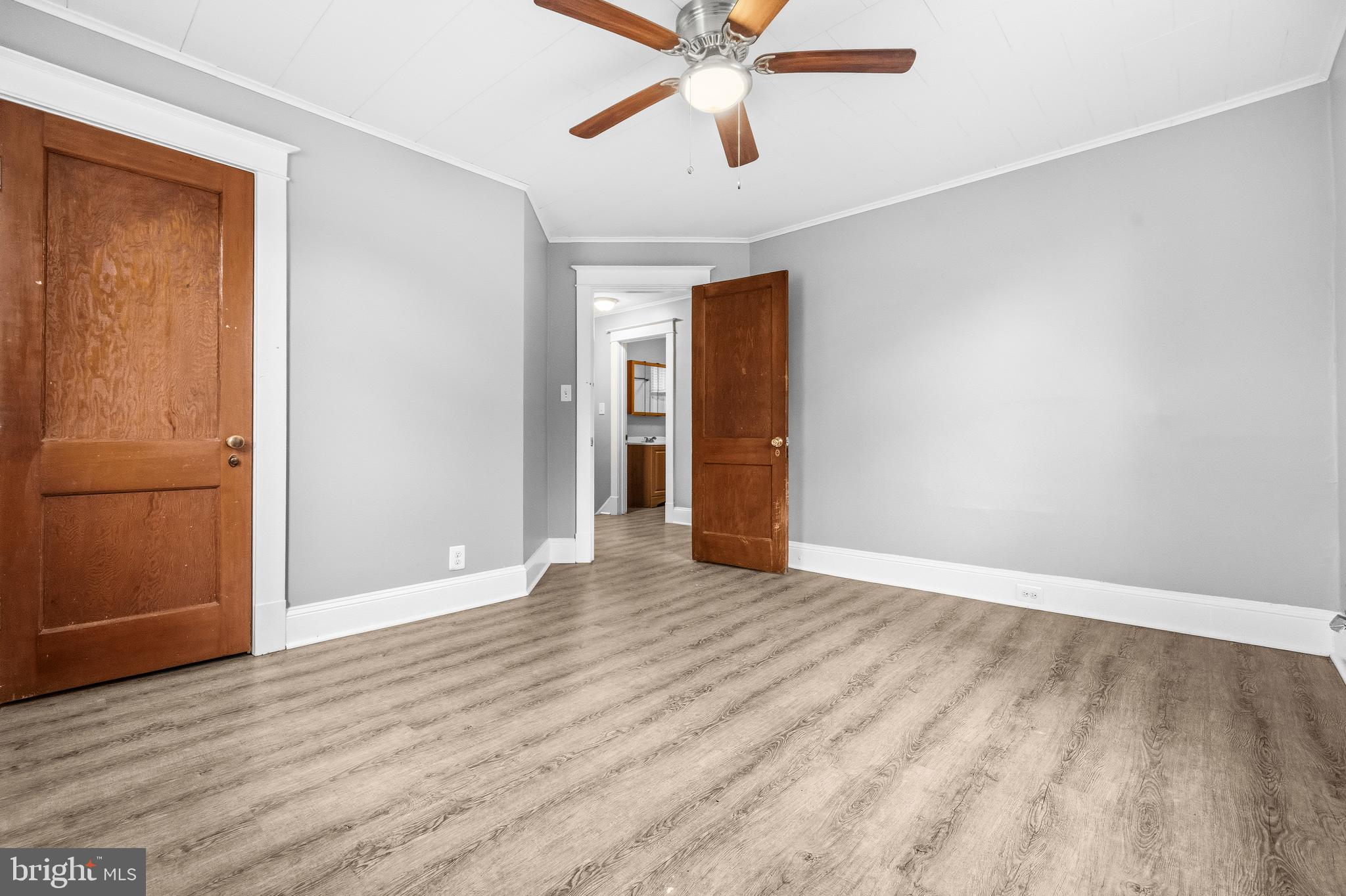 12 Leeway Dundalk, MD 21222 - Photo 21 of 34 a view of an empty room with wooden floor