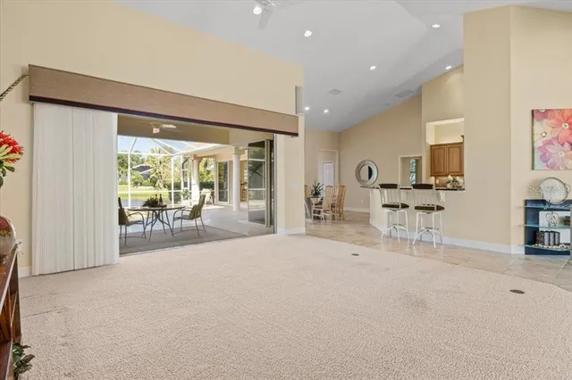 a kitchen with stainless steel appliances granite countertop a refrigerator stove and microwave