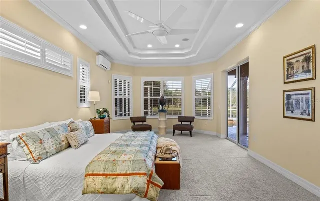 a room with pool table and a ceiling fan