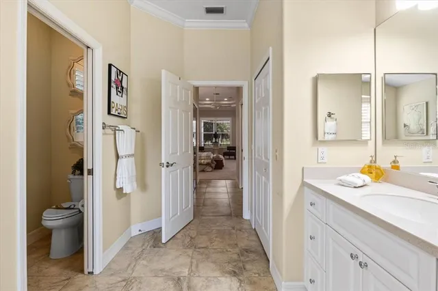 a swimming pool with outdoor seating