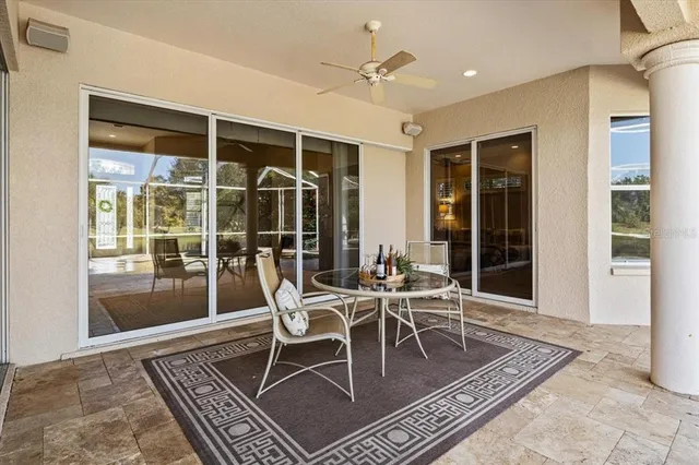 an aerial view of a house with a lake view