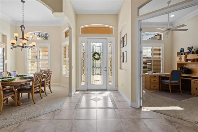 a view of living room with furniture and a window