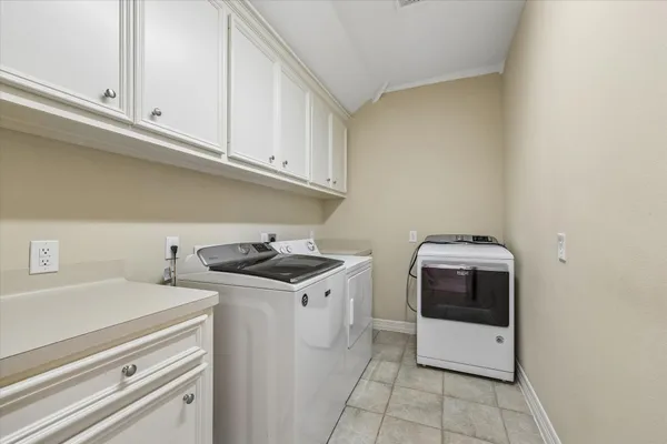 a bathroom with a sink vanity and mirror