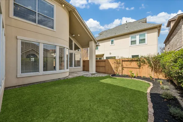 a view of a house with a garden