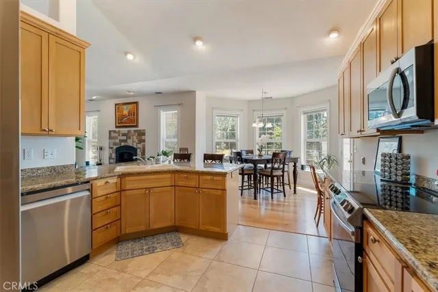 a dining room with furniture and window