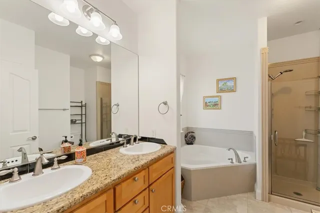 a bathroom with a bathtub and shower