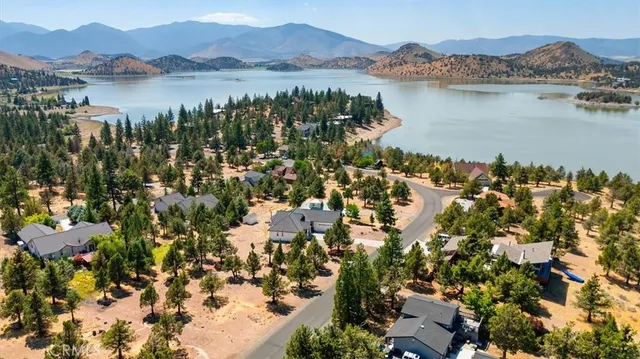 an aerial view of residential house and green space