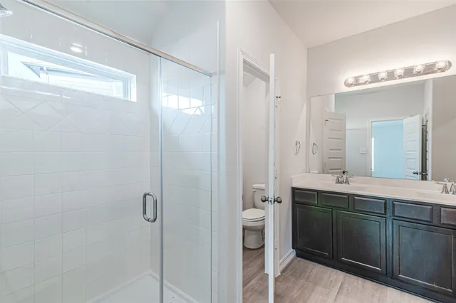 an aerial view of a house with a swimming pool