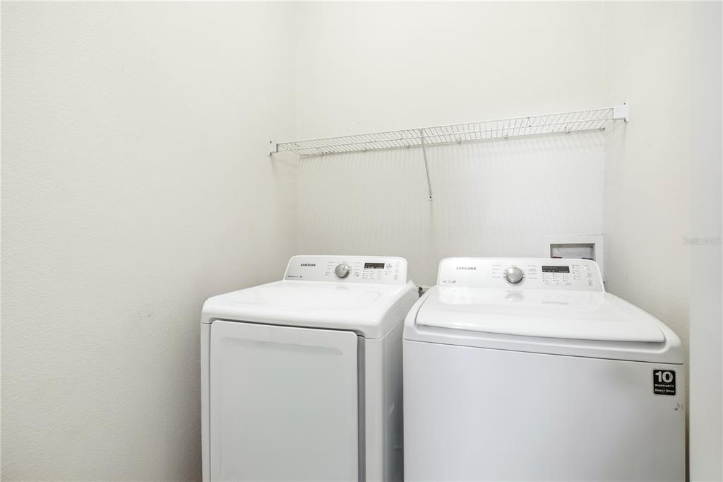13107 Heming Way Orlando, FL 32825 - Photo 20 of 23 a utility room with dryer and washer