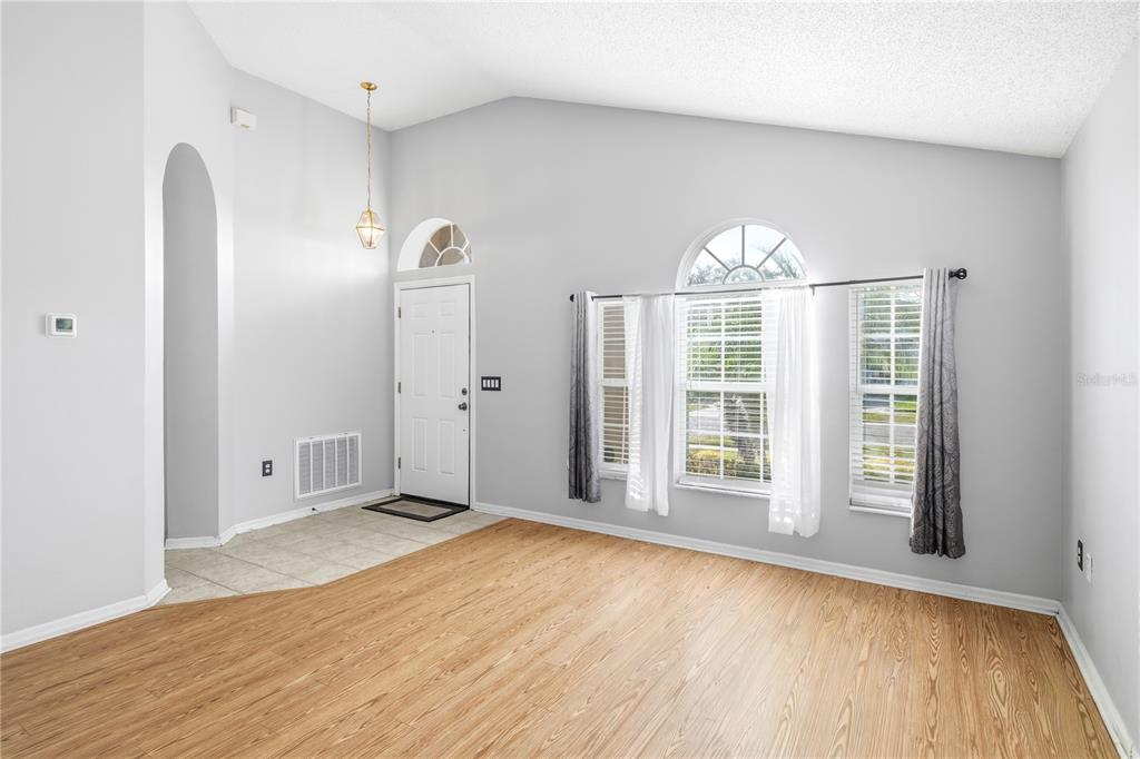 13107 Heming Way Orlando, FL 32825 - Photo 2 of 23 a view of an empty room with a window