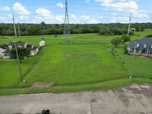 a view of a golf course with a lake