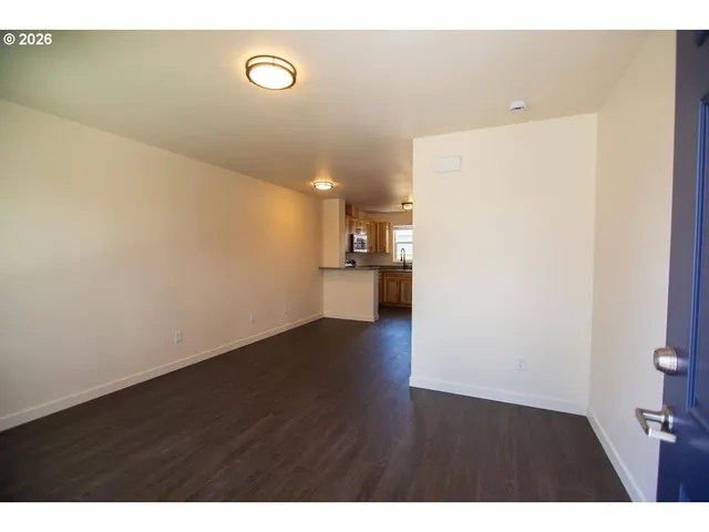 a bathroom with a toilet a sink and shower