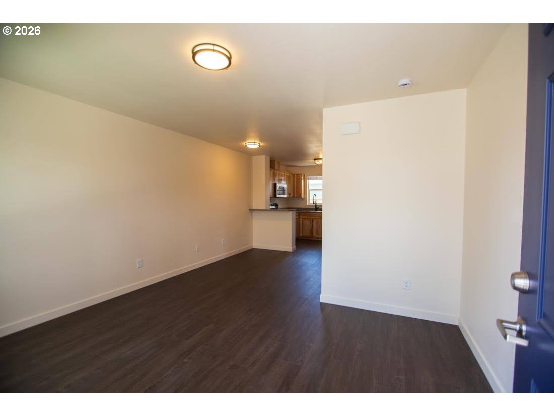 1638 S Street Springfield, OR 97477 - Photo 14 of 31 a view of empty room with wooden floor