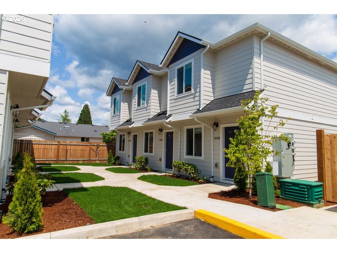 1638 S Street Springfield, OR 97477 - Photo 2 of 31 a front view of a house with garden