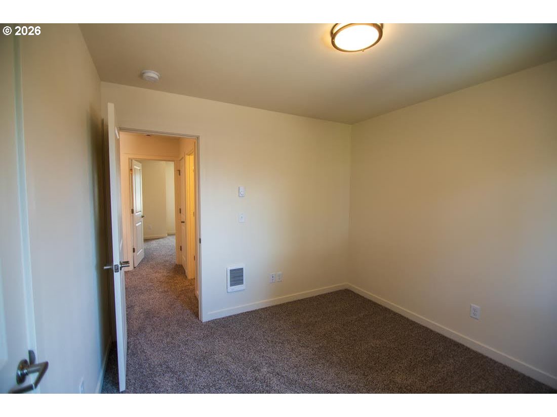 1638 S Street Springfield, OR 97477 - Photo 25 of 31 a view of a room with wooden floor