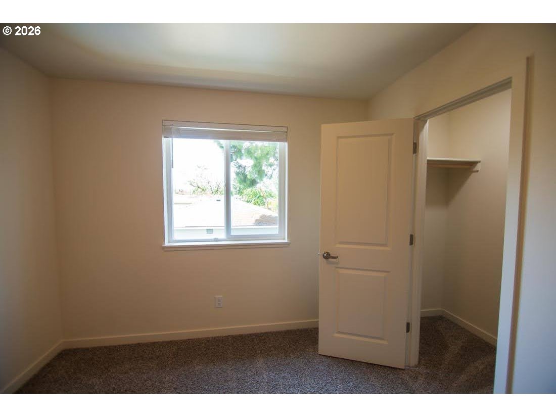 1638 S Street Springfield, OR 97477 - Photo 30 of 31 a room with window and closet