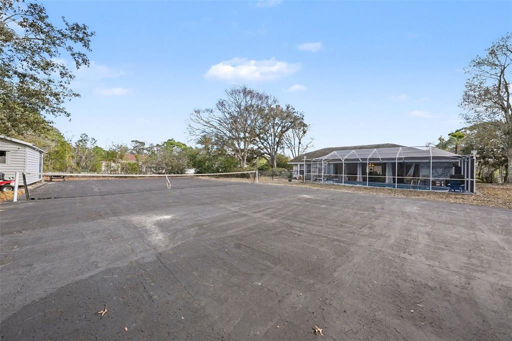 2583 Running Oak Court Spring Hill, FL 34608 - Photo 12 of 13 a view of a house with a yard