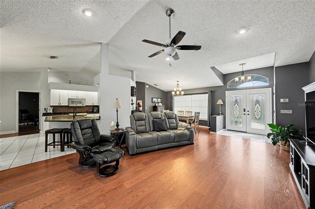 2583 Running Oak Court Spring Hill, FL 34608 - Photo 3 of 13 a living room with furniture and a large window