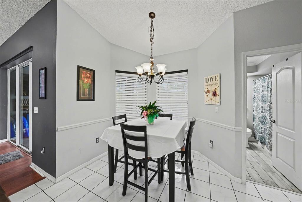 2583 Running Oak Court Spring Hill, FL 34608 - Photo 5 of 13 a dining room with furniture and window
