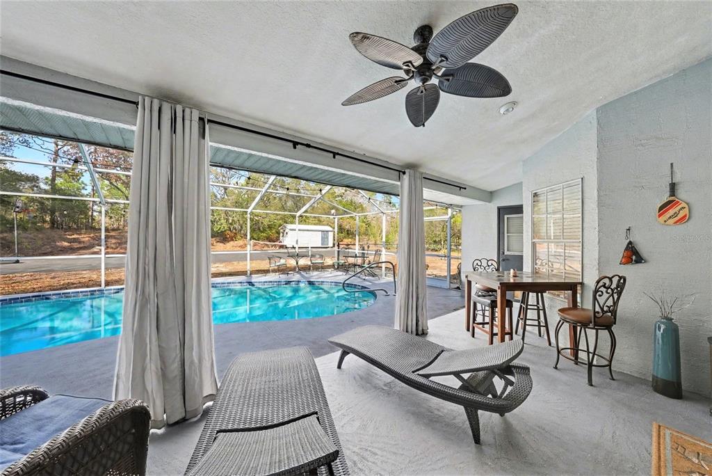 2583 Running Oak Court Spring Hill, FL 34608 - Photo 9 of 13 a living room with furniture and a large window