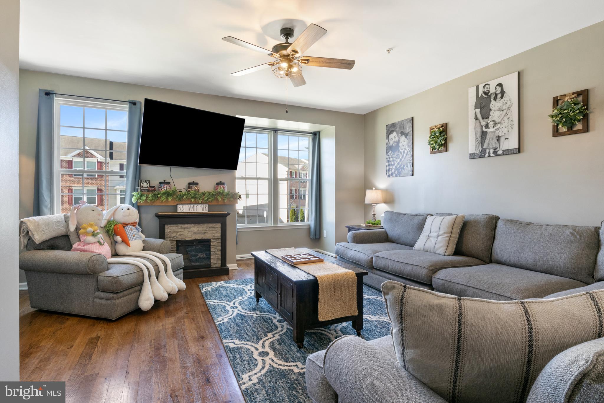855 Blossom Drive Hanover, PA 17331 - Photo 11 of 53 a living room with furniture fireplace and a flat screen tv