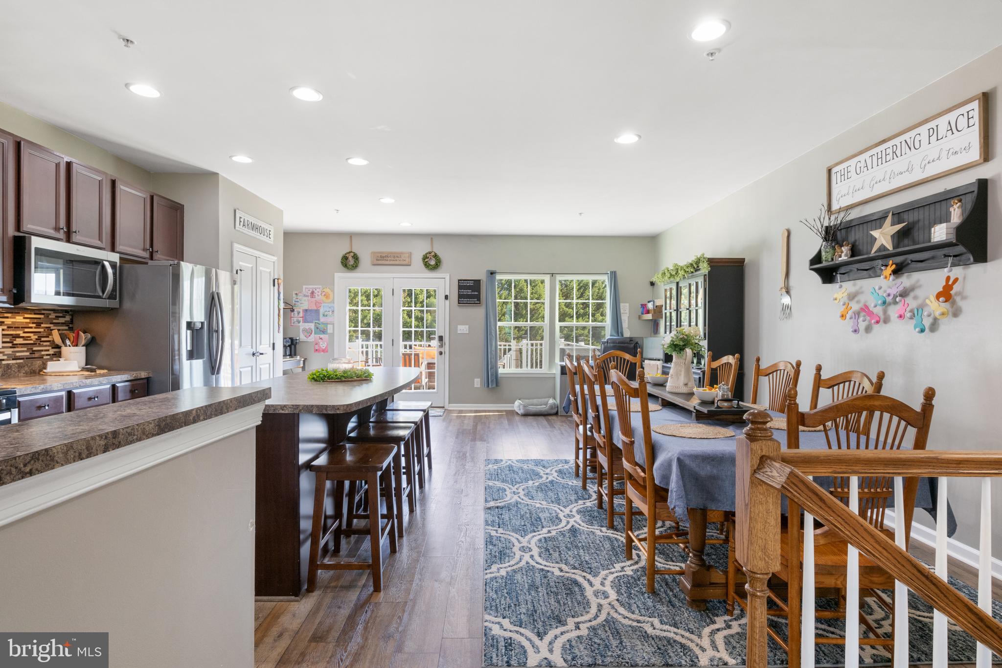 855 Blossom Drive Hanover, PA 17331 - Photo 13 of 53 a view of a dining room with furniture window and wooden floor