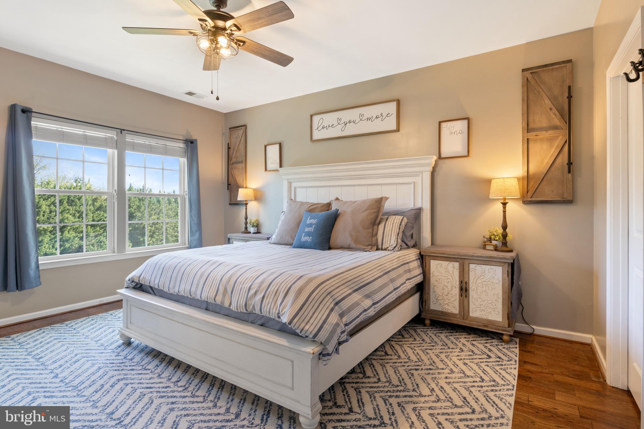 855 Blossom Drive Hanover, PA 17331 - Photo 27 of 53 a bedroom with a bed and a chandelier