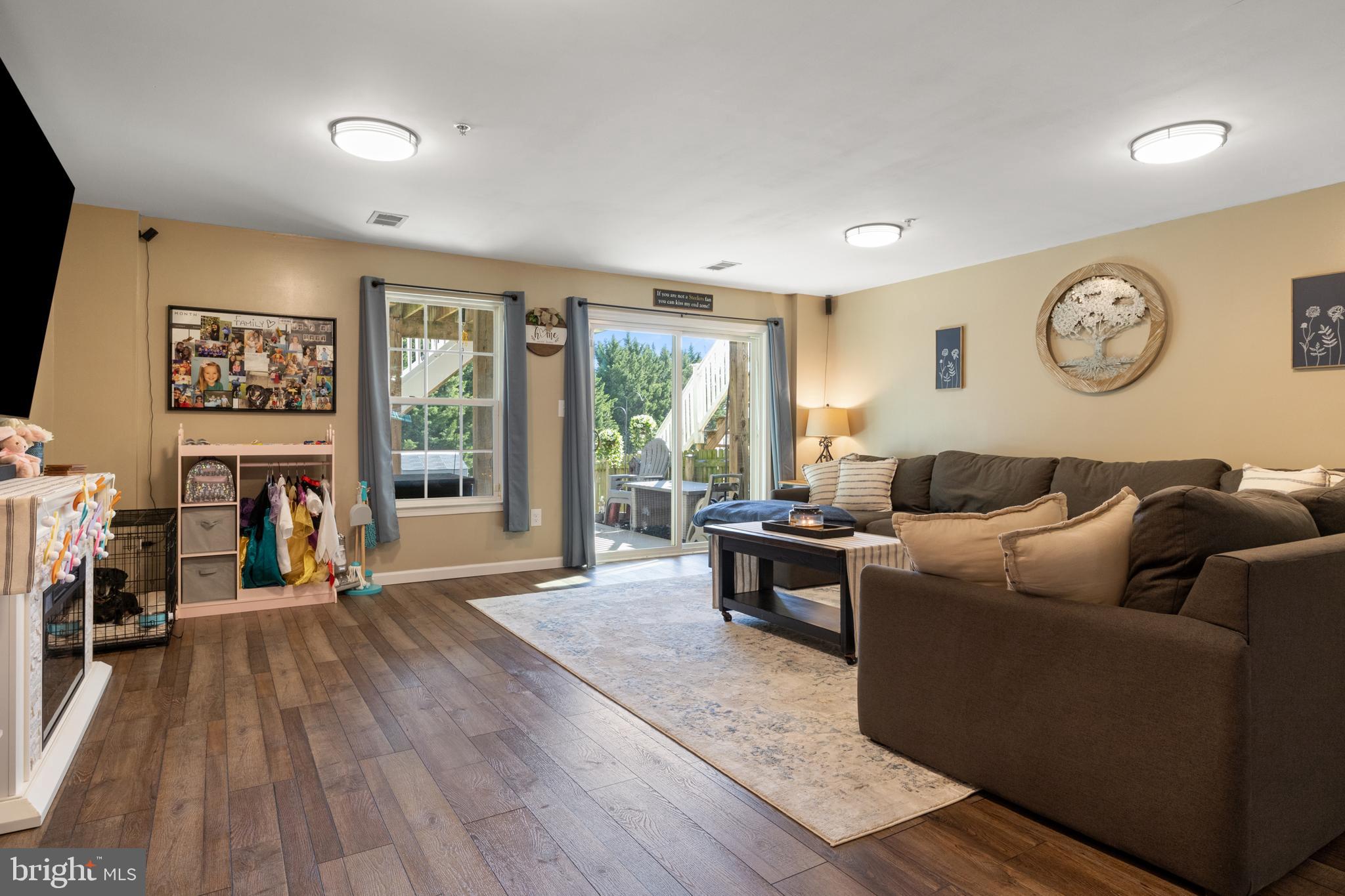 855 Blossom Drive Hanover, PA 17331 - Photo 5 of 53 a living room with fireplace furniture and a flat screen tv
