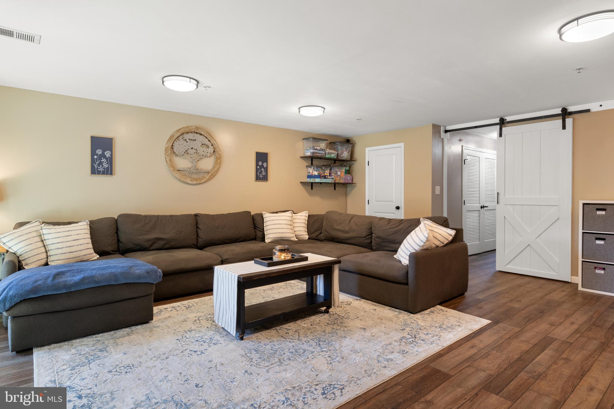 855 Blossom Drive Hanover, PA 17331 - Photo 7 of 53 a living room with furniture and a wooden floor
