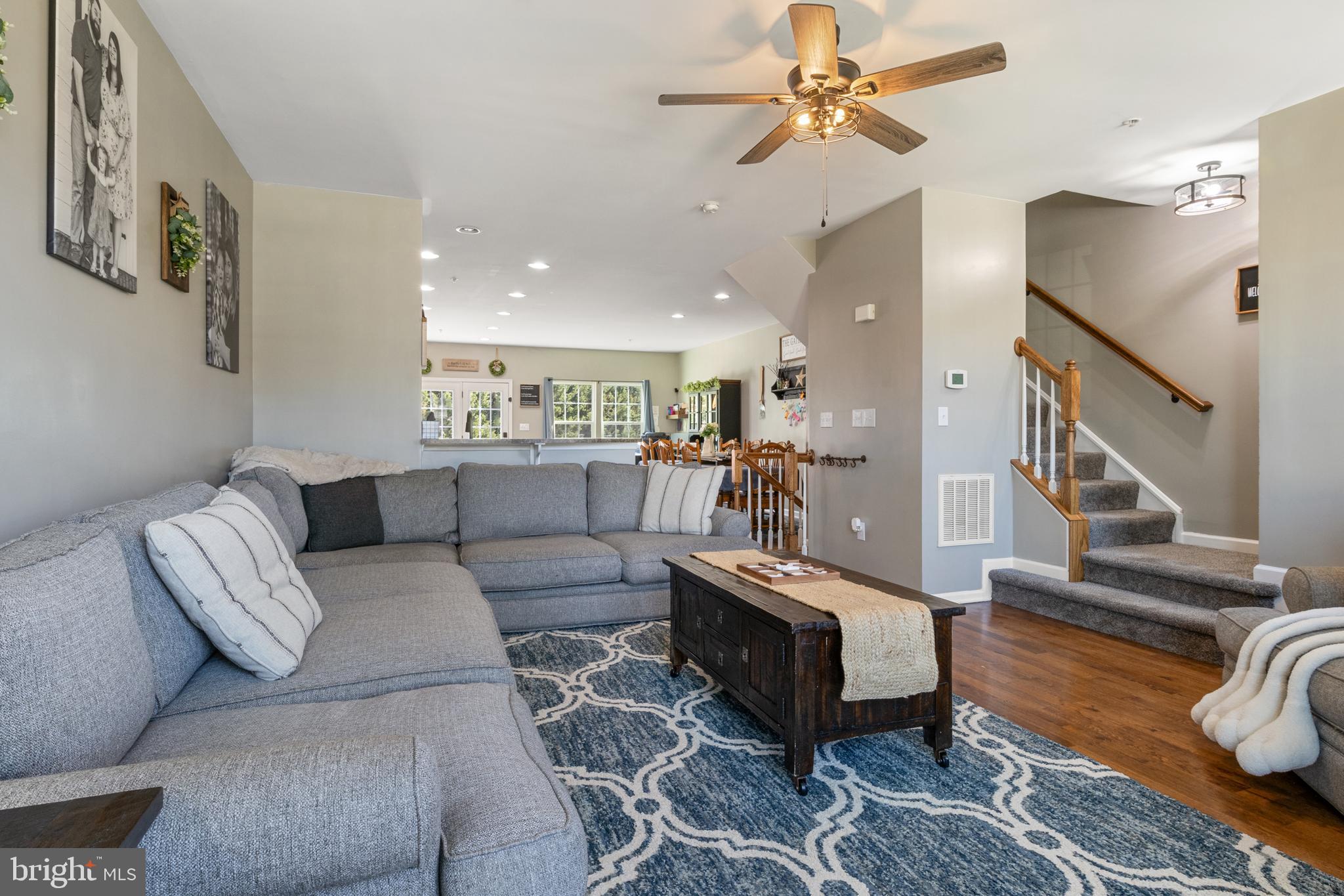 855 Blossom Drive Hanover, PA 17331 - Photo 10 of 53 a living room with furniture ceiling fan and a rug