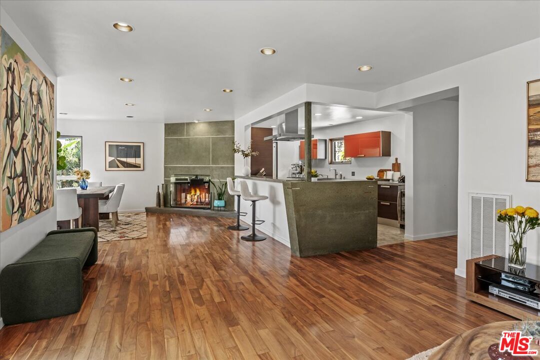 3234 Hillock Drive Los Angeles, CA 90068 - Photo 8 of 25 a living room with furniture and a wooden floor