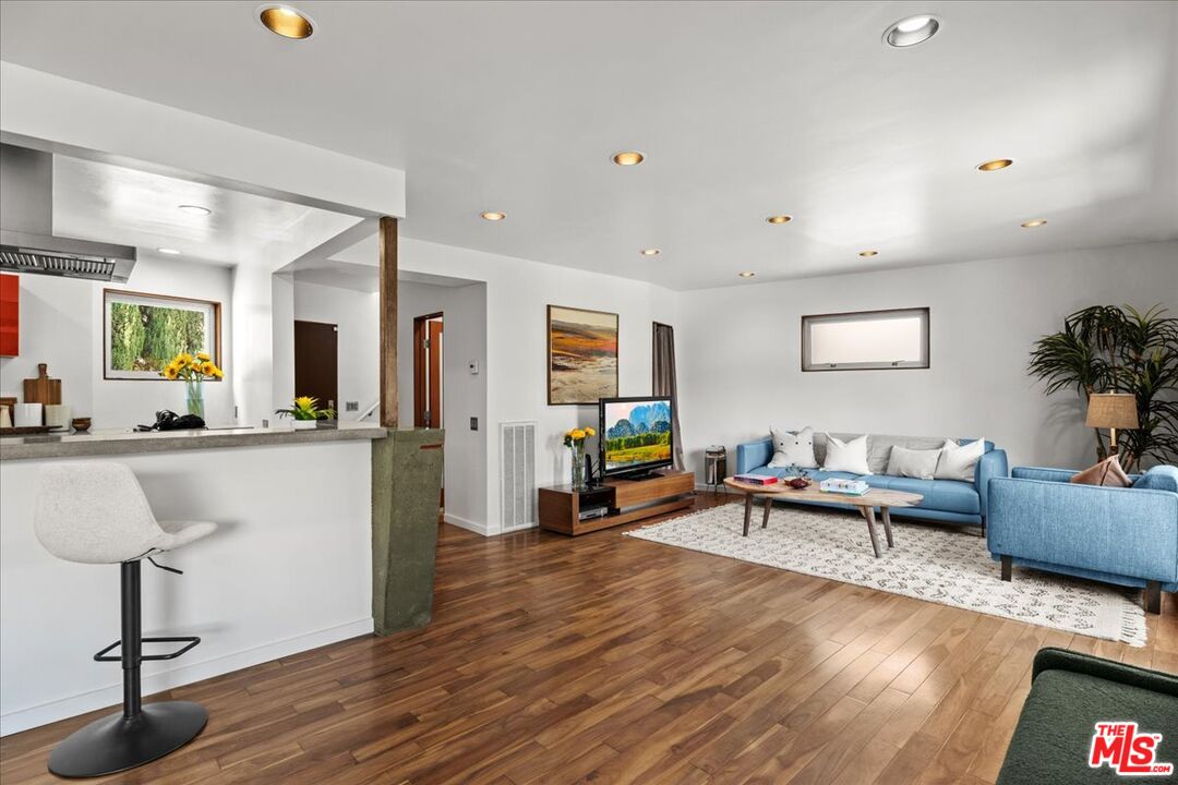 3234 Hillock Drive Los Angeles, CA 90068 - Photo 9 of 25 a living room with furniture and a wooden floor