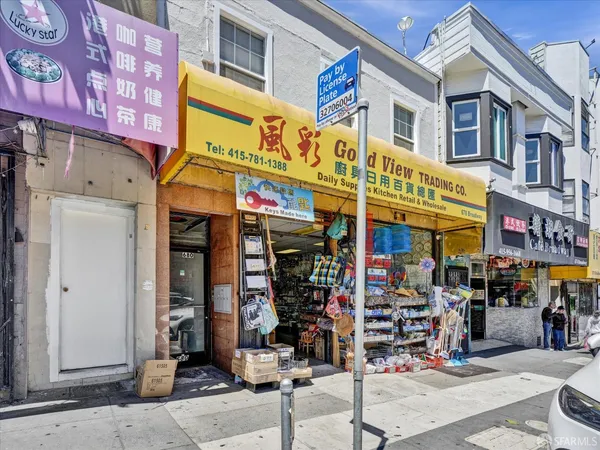 a view of street with shops