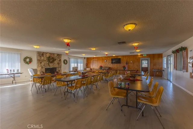 a room with gym equipment and windows