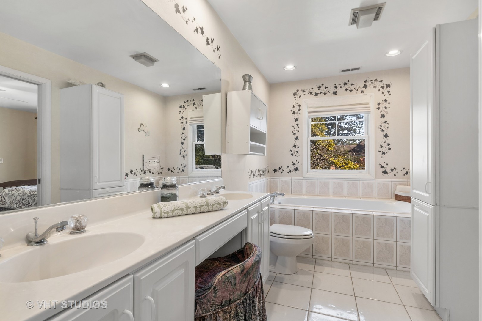 1600 Good Avenue Park Ridge, IL 60068 - Photo 13 of 20 a bathroom with a double vanity sink mirror and toilet