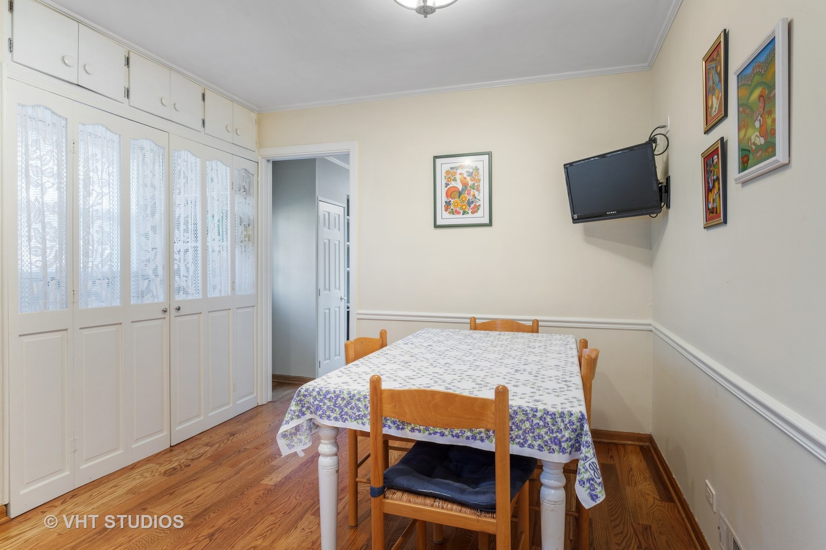 1600 Good Avenue Park Ridge, IL 60068 - Photo 7 of 20 a bedroom with a bed and a flat screen tv