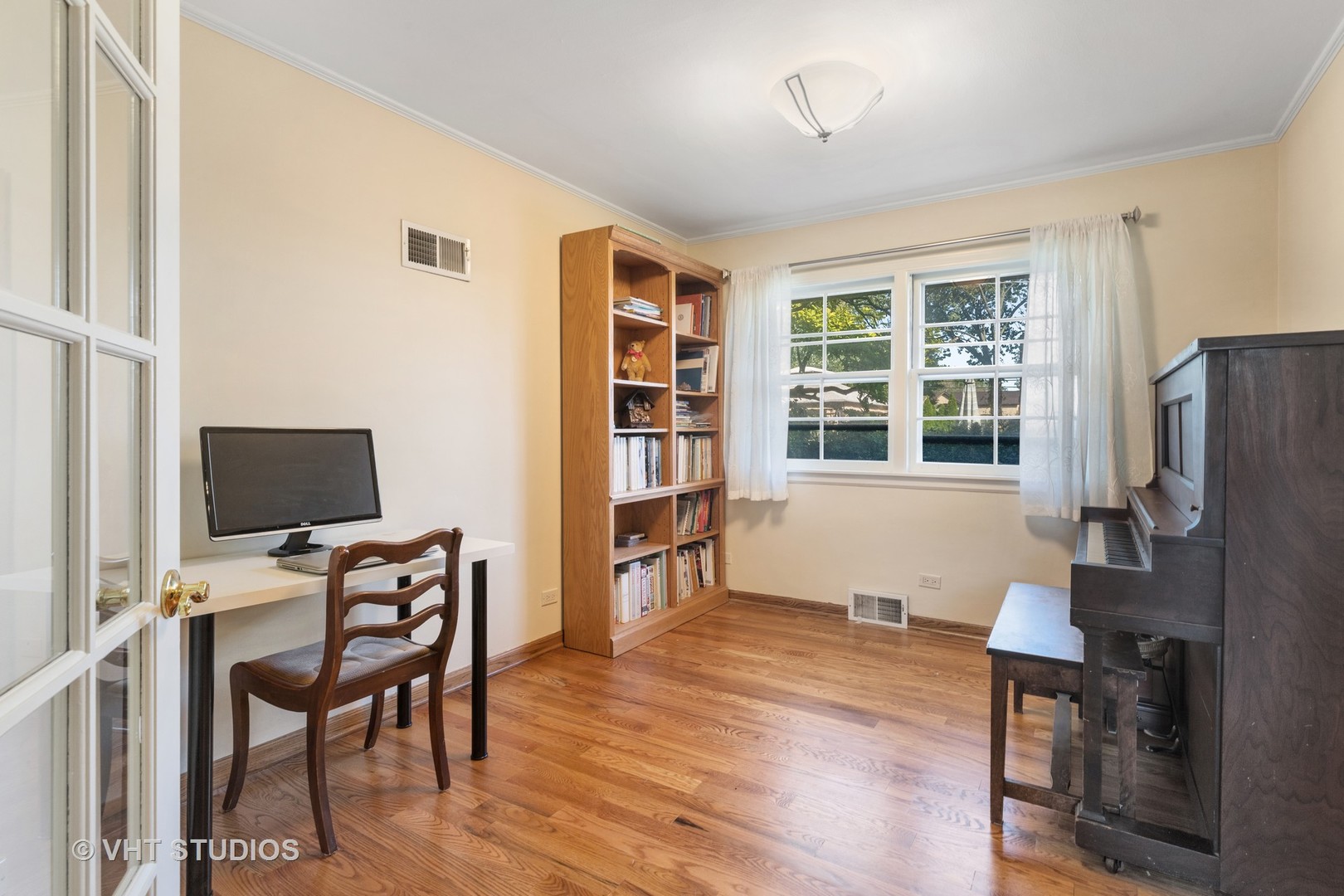 1600 Good Avenue Park Ridge, IL 60068 - Photo 8 of 20 a view of a workspace with furniture and a window
